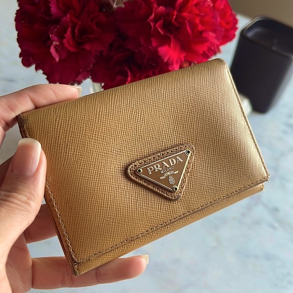 Prada Handbags - PRADA Wallet. Tan color. Saffiano material.